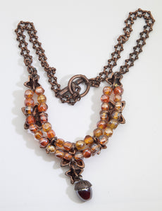 Amber colored glass acorn copper necklace  - JD10705